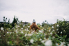 woman walking in greenery